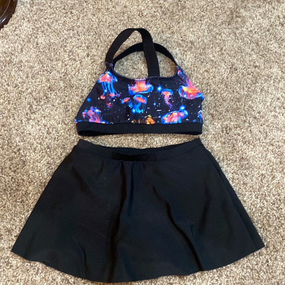 New girls bikini size 7 T. Jellyfish pattern on shorts under swim skirt.